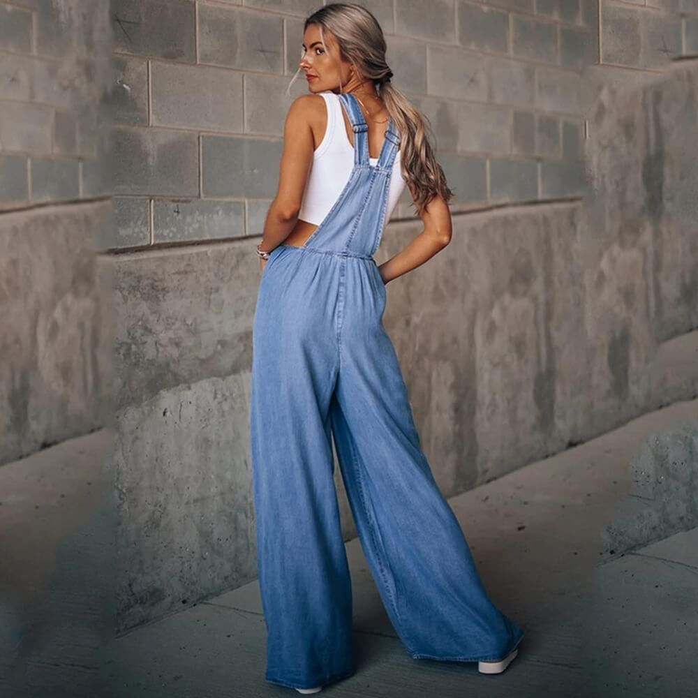 Dark blue stylish denim jumpsuit on the model