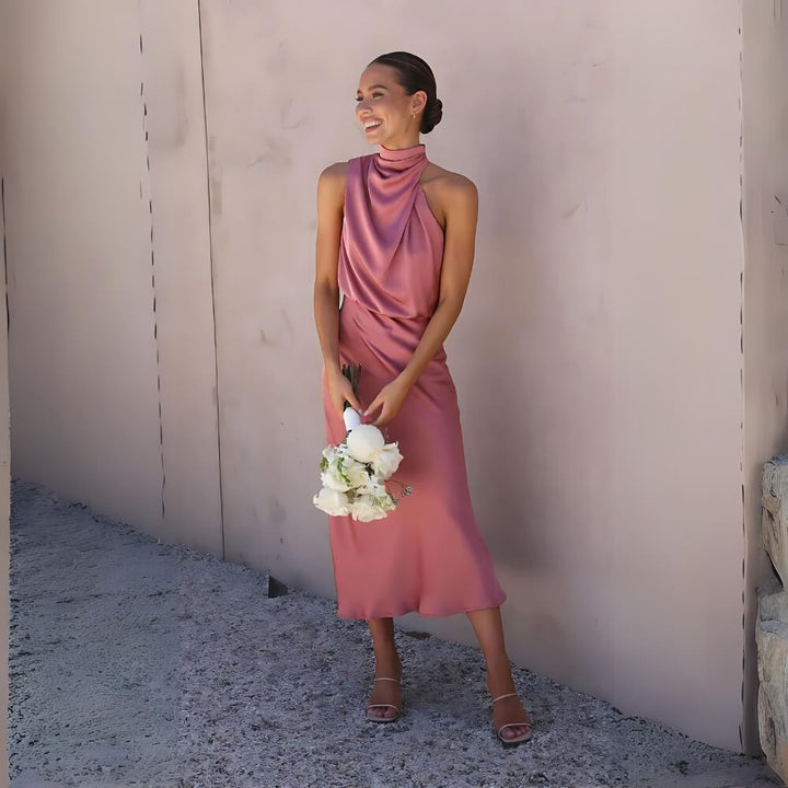 Pink shiny maxi dress on the model