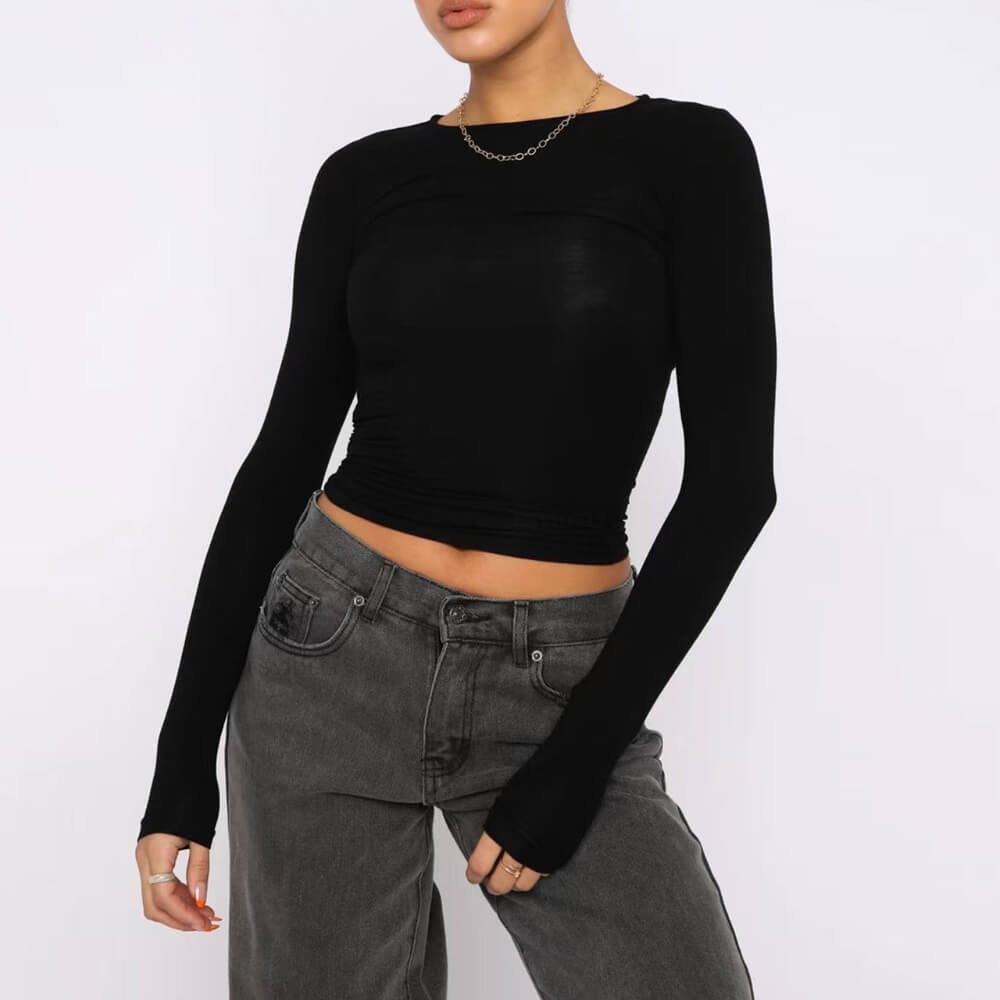 Black elegant long-sleeved shirt on the model