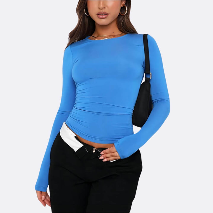 Blue elegant long-sleeved shirt on the model