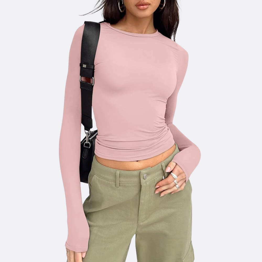 Pink elegant long-sleeved shirt on the model